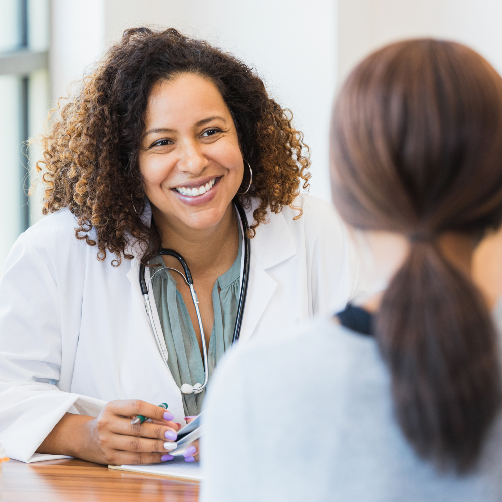 Doctor smiles at patient
