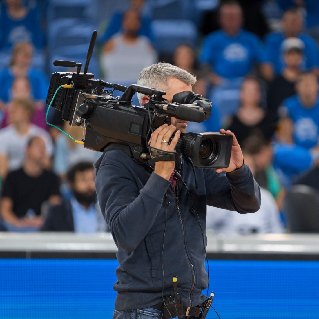 Camera man records event