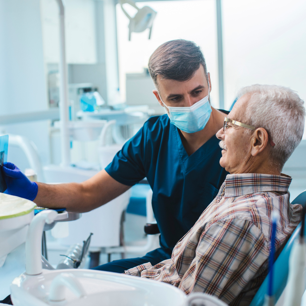 Dentist talks to patient